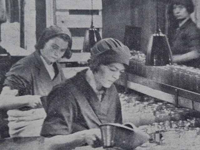 Conveyers revolved around, bringing in fresh batches of jars for the workers to fill with marmalade
