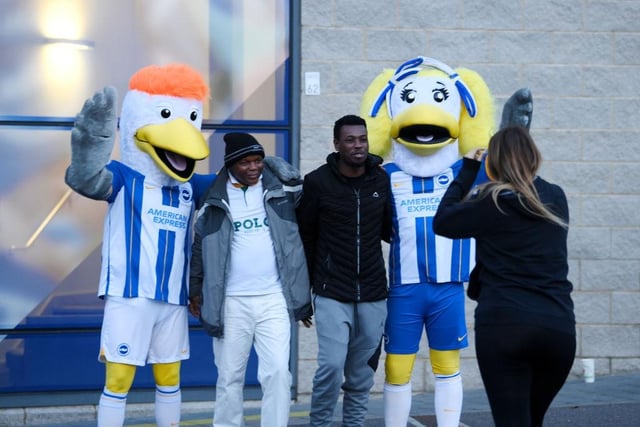 BRIGHTON, ENGLAND - OCTOBER 18: Fans pose with Gully and Sally, mascots of Brighton & Hove Albion outside the stadium prior to the Premier League match between Brighton & Hove Albion and Nottingham Forest at American Express Community Stadium on October 18, 2022 in Brighton, England. (Photo by Mike Hewitt/Getty Images)