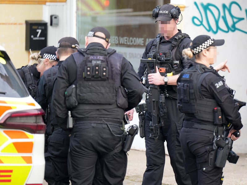 A serious incident has been reported in the vicinity of The Esplanade, Worthing, with armed police officers pictured at West Worthing railway station