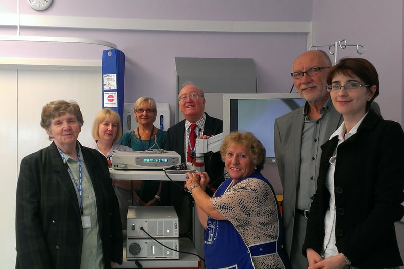 Crawley Hospital League of Friends donate £12,500 for new scanner (L-R) consultants Cinzia Voltolina and George Richter, League of Friends treasurer Celia Putland, Susan Swetman, Pam Pritchard, League of Friends vice chairman David Hawkins and fundraiser Maria Hains