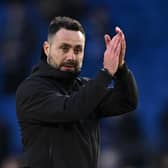 Roberto De Zerbi, Manager of Brighton & Hove Albion, applauds the fans after the draw against Everton