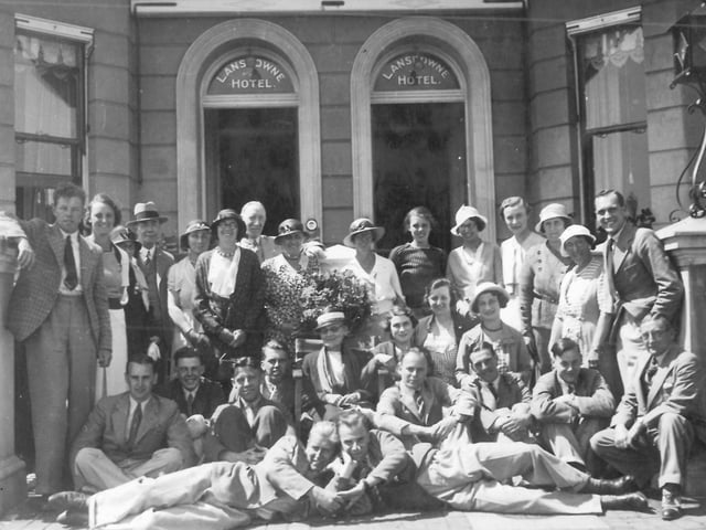 The family outside the hotel