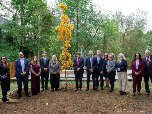 A group picture of the commemorative tree planting for Vent-Axia's 90th anniversary