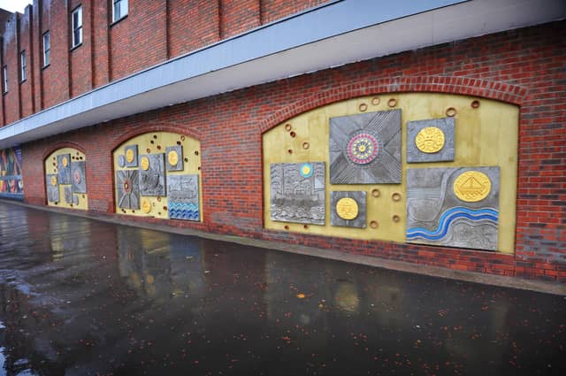 Restoration of the Sainsbury's Concrete Mural by Bexhill Heritage.
