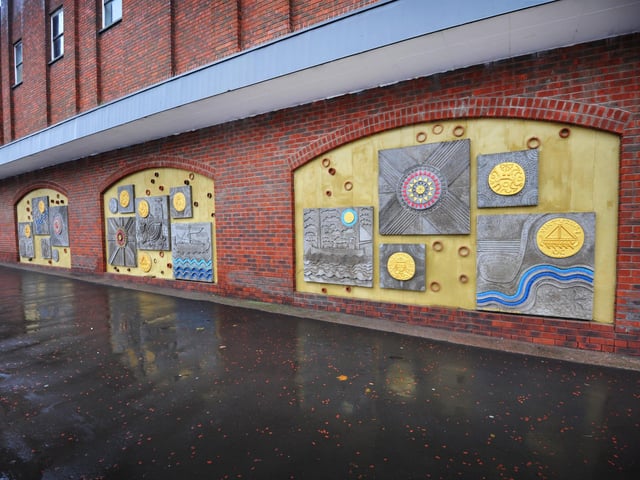 Restoration of the Sainsbury's Concrete Mural by Bexhill Heritage.