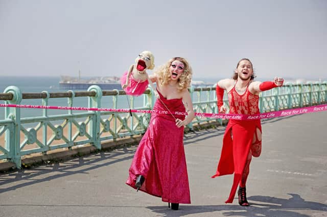 Brighton drag queens Scarlett Fever with puppet Roxie and Boss