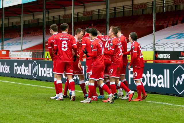 Nick Tsaroulla celebrates his goal for Crawley. Picture by Jamie Evans