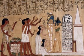 Priests performing rituals in front of a mummy - from The Book Of The Dead