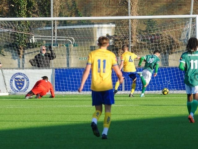 Action from Lancing's 3-2 win over Ashford United on Saturday. Picture by Stephen Goodger