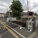 Train passengers faced delays of up to 15 minutes, after a fault with level crossing barriers near Polegate. Photo: Google Street View