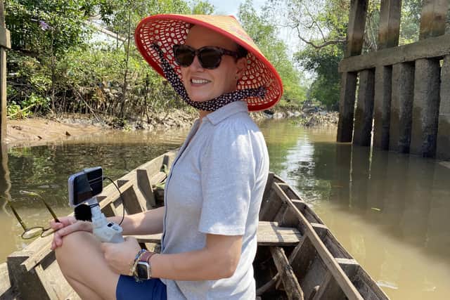 Patricia Rykiel from Burgess Hill (pictured in Mekong Delta, Vietnam, January 2024) rediscovered 'Don't Break My Rice Bowl' by her dad Robert H. Dodd during the first Covid lockdown of 2020