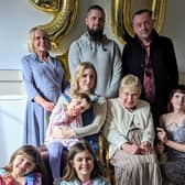 Avril Andrew with two of her three children, her three grandchildren and three of her five great grandchildren