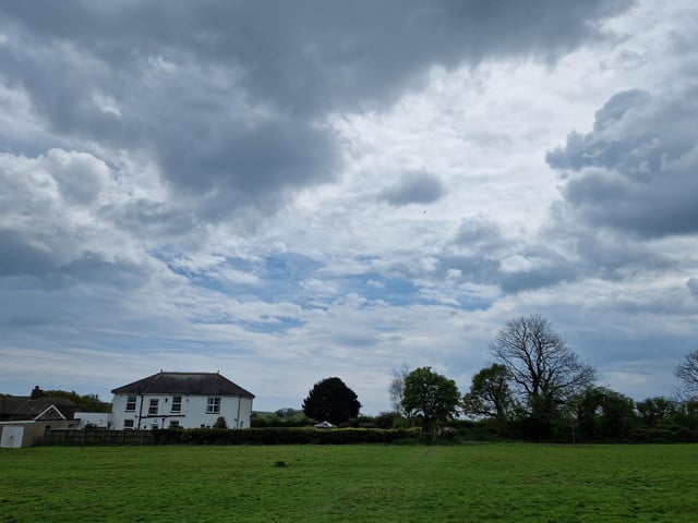 Walk towards Orchard House Farm and through another gate
