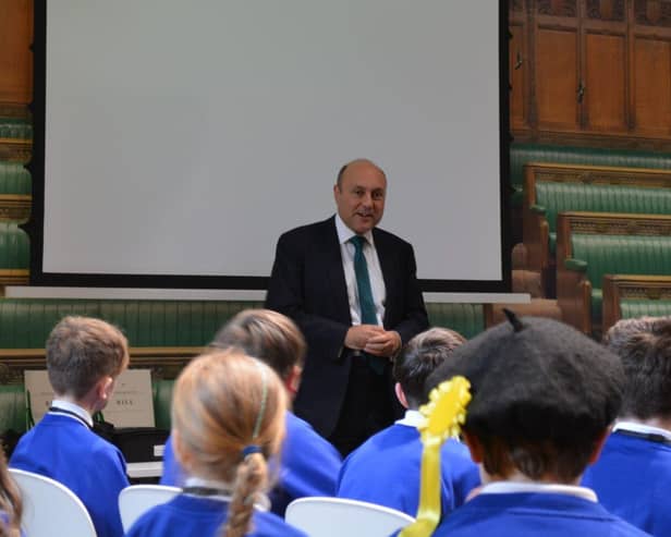 Andrew with primary school pupils in Houses of Parliament