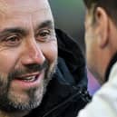 Brighton's Italian head coach Roberto De Zerbi (L) speaks with Chelsea's Argentinian head coach Mauricio Pochettino (R) prior to the English Premier League football match between Brighton and Hove Albion and Chelsea at the American Express Community Stadium in Brighton, southern England on May 15, 2024. (Photo by Glyn KIRK / AFP) / RESTRICTED TO EDITORIAL USE. No use with unauthorized audio, video, data, fixture lists, club/league logos or 'live' services. Online in-match use limited to 120 images. An additional 40 images may be used in extra time. No video emulation. Social media in-match use limited to 120 images. An additional 40 images may be used in extra time. No use in betting publications, games or single club/league/player publications. /  (Photo by GLYN KIRK/AFP via Getty Images)