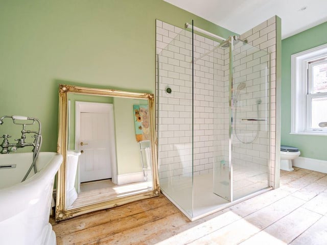 There is a family bathroom and additional cloakroom