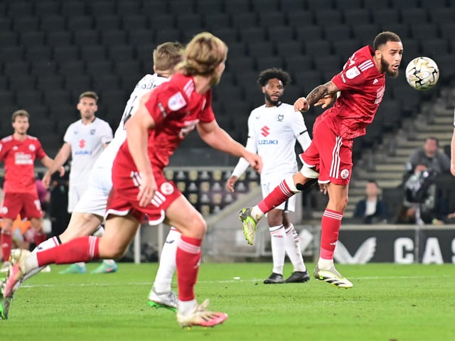 Crawley Town defender Jay Williams (26) heads the ball at goal during the EFL Sky Bet League 2 play-off second leg match between Milton Keynes Dons and Crawley Town at stadium:mk, Milton Keynes, England on 11 May 2024.:Crawley Town hammered MK Dons 5-1 - and 8-1 on aggregate - to reach the League Two play-off final Wembley. Photographer Dennis Goodwin/Pro Sport Images was there to catch the action, the crowd and the celebrations