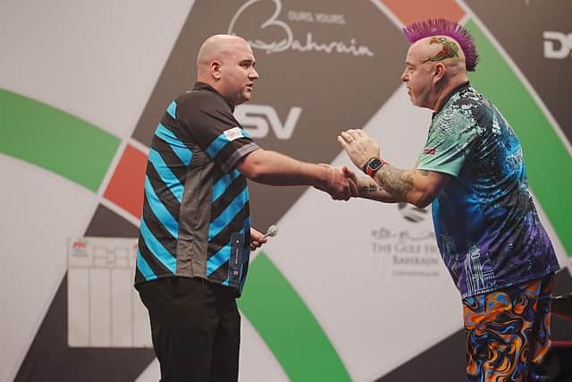 Rob Cross and Peter Wright in Bahrain | Picture: PDC