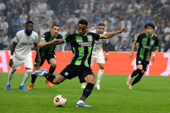 Brighton's Brazilian striker #09 Joao Pedro scores a penalty