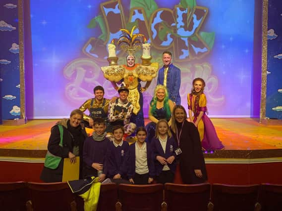 Peacehaven Heights Academy pupils with the cast of Jack and the Beanstalk.