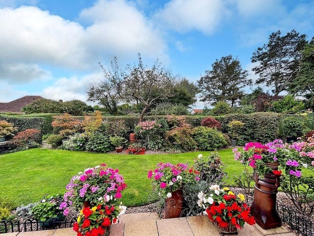 This three-bedroom, detached house with a stunning south-facing garden has come on the market with Graham Butt priced at £695,000