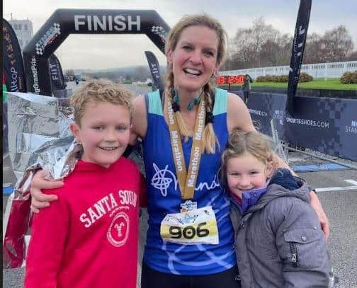 Belinda with her children after completing the Goodwood Marathon last year as part of her training