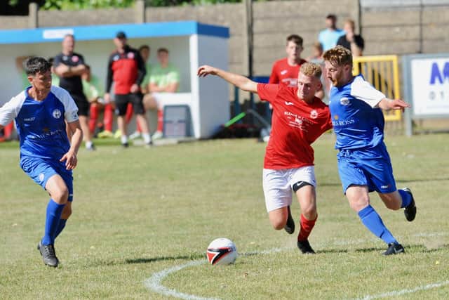 Action in Shoreham's 1-1 SCFL draw with Arundel | Picture: Stephen Goodger