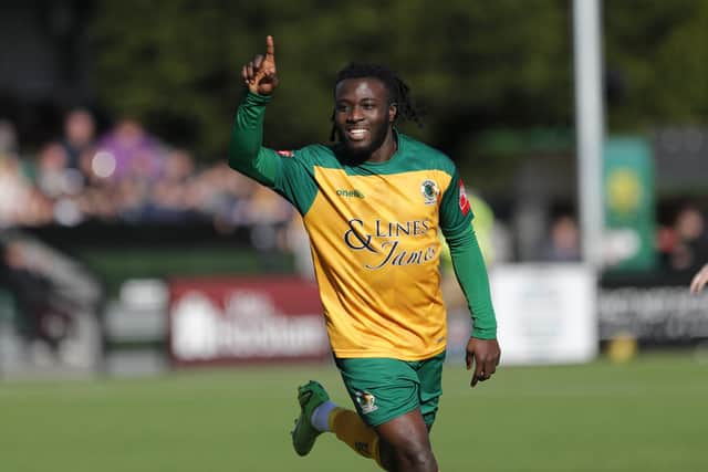 Daniel Ajakaiye celebrates his first goal of the afternoon against Bowers & Pitsea