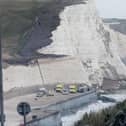 Emergency service vehicles at the bottom of the cliffs in Saltdean on the afternoon of Thursday, October 15