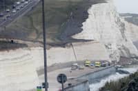 Emergency service vehicles at the bottom of the cliffs in Saltdean on the afternoon of Thursday, October 15