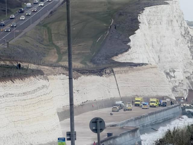 Emergency service vehicles at the bottom of the cliffs in Saltdean on the afternoon of Thursday, October 15. Photo: Sussex News and Pictures