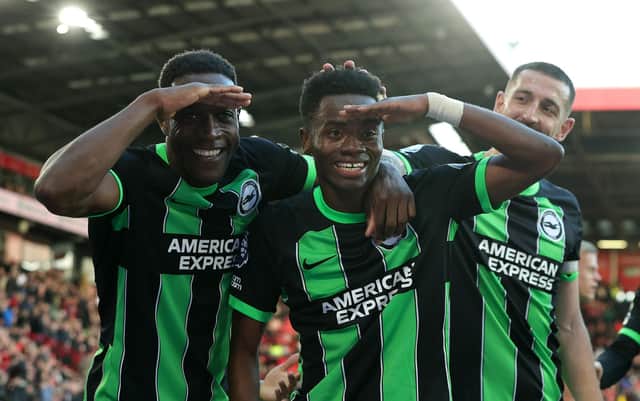 SHEFFIELD, ENGLAND - FEBRUARY 18: Simon Adingra of Brighton & Hove Albion celebrates scoring his team's fourth goal during the Premier League match between Sheffield United and Brighton & Hove Albion at Bramall Lane on February 18, 2024 in Sheffield, England. (Photo by David Rogers/Getty Images)