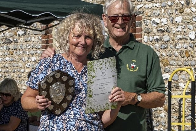 Sarah Hill receives the Ray Brown Memorial Shield from Colin Crane at East Preston and Kingston Horticultural Society flower show