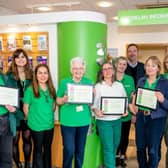QVH Macmillan Cancer Information and Support Centre team celebrating 11 years of serving the community.