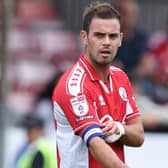 Dion Conroy wears the captain's armband for Crawley Town last season | Picture: Natalie Mayhew/Butterfly Football