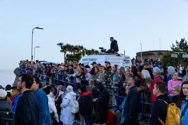 Crowds look to the skies for signs of alien life. Photo: TK Photography
