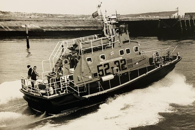 On the morning of 16 October in the wake of the great storm of 1987, telephone lines and radio ariels were down, so when the Mayday from French fishing vessel ‘La Françoise’ was relayed by Solent Coastguard to Newhaven Coastguard, news of the vessel’s predicament was shouted across the river to Newhaven RNLI's 'Keith Anderson' (featured), busy helping the marina recover boats and pontoons that had been swept across the harbour by the storm. A Framed Letter of Thanks signed by the Chairman of the Institution was awarded to Coxswain Len Patten in recognition of his perseverance and expert boat handling, rescuing ‘La Françoise’ and her crew of five. A Letter of Commendation from the Director was sent to the crew for their very considerable part in the rescue. A Letter of Appreciation from the Chief of Operations was sent to Mike Tubb for his help as interpreter. Crew on 16 October 1987: Len Patten (Coxswain), Paddy Boyle (Second Coxswain), Mike Beach (Mechanic), Chris Bird, Phill Corsi, Nick Gentry, Ian Johns.