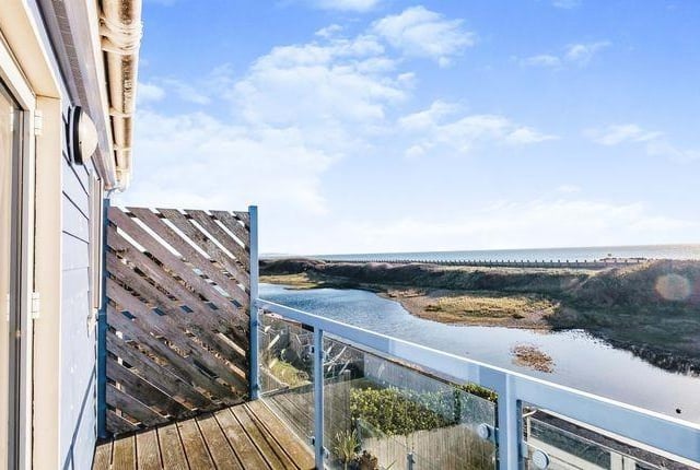 Three bed semi-detached house for sale, £750,000.
The architect designed house has a spectacular outlook with south facing views over the Widewater lagoon and sea beyond. There is direct access to both lagoon and beach, perfect for swimming, kite surfing, paddle boarding etc. The property also has a balcony from the main bedroom and a tiered garden.