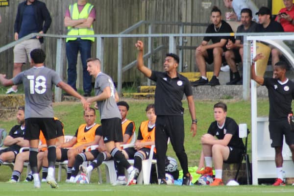 Crawley Town boss Kevin Betsy gives instructions at East Grinstead