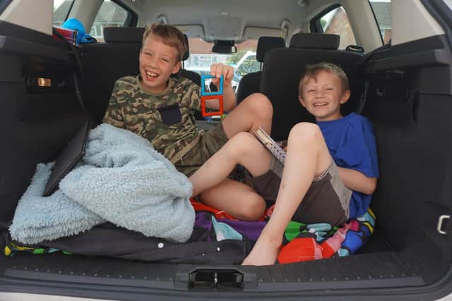 Sammy and Oakley from Sheddingdean Community Primary School in Burgess Hill raised more than £800 by spending Saturday, May 21,  in a car boot