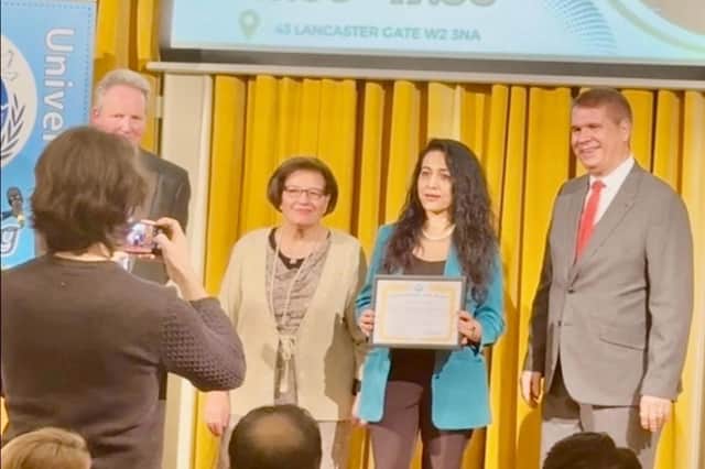Dr Sangita Shrestha receiving her award. Picture: submitted