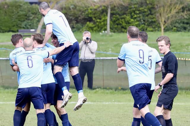 Little Common celebrate a breakthrough at Bexhill | Picture: Joe Knight