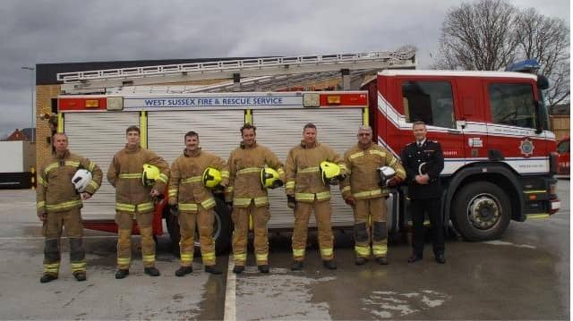 The four new recruits with their trainers and the Assistant Chief Fire Officer, Peter Rickard. Photo: West Sussex Fire and Rescue Service