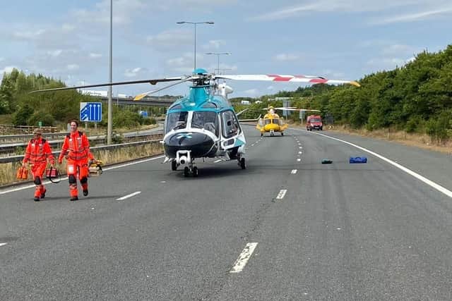 A KSS helicopter attending a road traffic collision