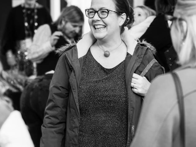 Local artist Charlotte Loukes has been a supporter of Children on the Edge for over a decade. She is pictured here while exhibiting at Chichester's Oxmarket Gallery.