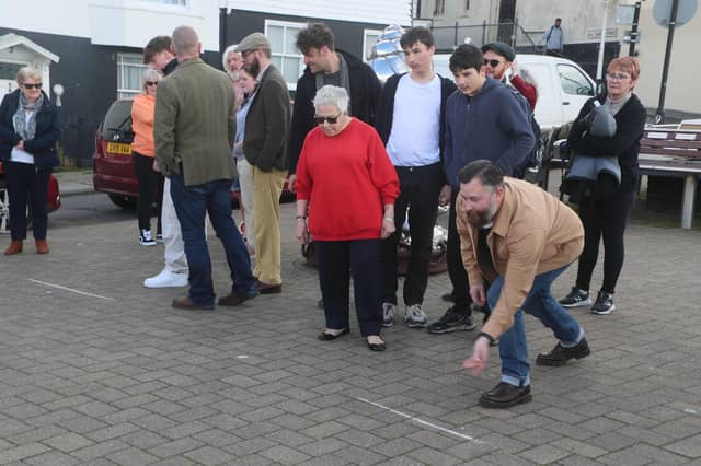 Marbles competition on Winkle Island in Hastings Old Town.
Photo by Roberts Photographic.
