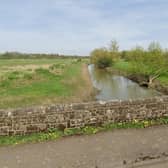 People are advised to avoid roads that flood, including the A281 at Mock Bridge. Photo: Google Street View