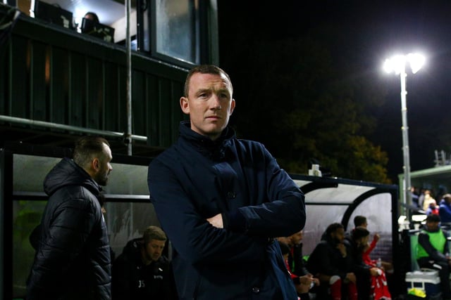 Neill Collins, Manager of Barnsley, looks on prior to the Emirates FA Cup First Round Replay match between Horsham and Barnsley at The Camping World Community Stadium.