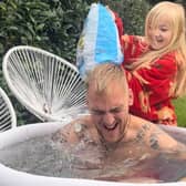 Esmie from Uckfield helping her dad Josh with his ice bath challenge