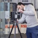 PROJECT MILESTONE: Three Sixty Design Solutions project operations manager Mike Wood sets up a FARO Focus Premium laser scanner which is being used in the firm’s first £1m contract